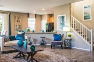 Photo of a home’s living room and kitchen