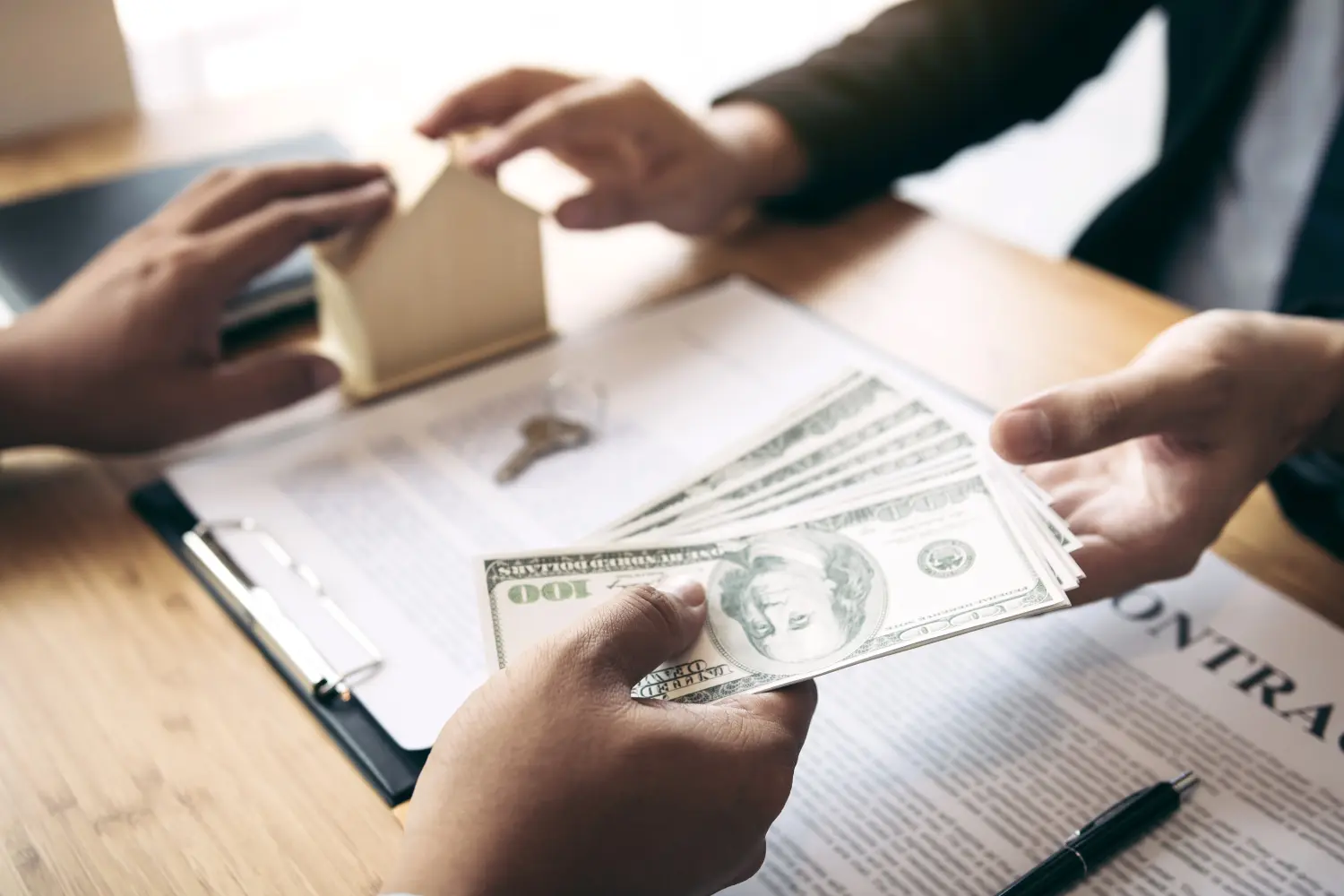 A cash real estate transaction taking place between two people